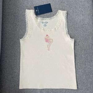 *RARE* Brandy Melville Ronnie Lace
Tank Top with a cute cupcake baby! •